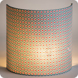 Fabric half lamp shade for wall light in Petit Pan fabric Kintaro
