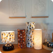 Cylinder fabric table lamp Goldie M lit, and Billie range