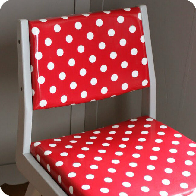 red polka dot chair